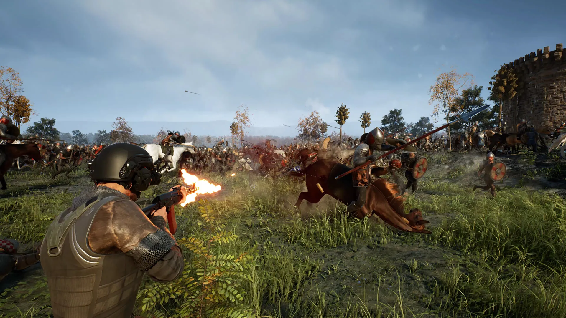 A soldier in a modern helmet fires a rifle at mounted riders charging across a grassy field.
