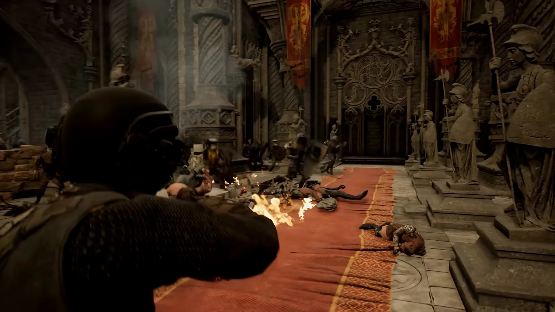 A helmeted soldier seen from behind fires a rifle down a red-carpeted stone hall lined with statues and banners, with flames at the muzzle and bodies on the floor.