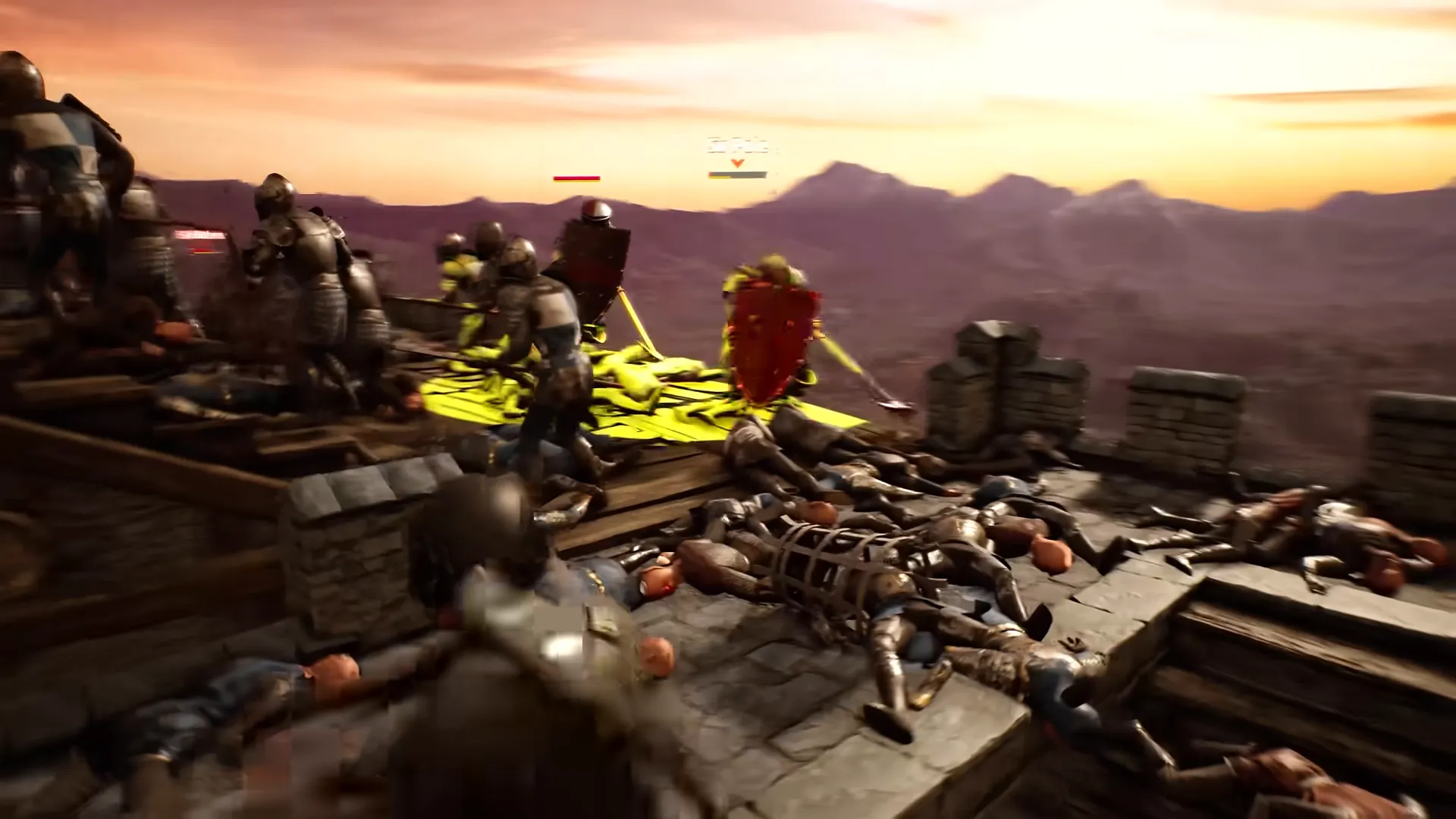 Fighting on a castle wall at sunset, with some soldiers highlighted in yellow and bodies across the walkway.